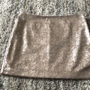 Ladies gold sequin skirt.